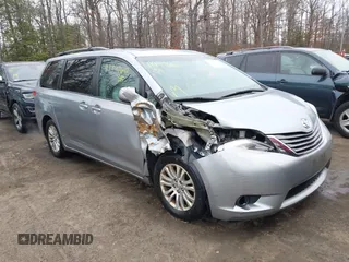 2014 Toyota Sienna XLE with VIN 5TDYK3DC5ES461184, listed as a IAAI auction lot 41447642 with 122,539 mi miles. Bid and sale history available at carsss.com. Image 1.