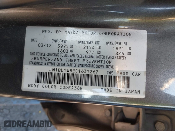 2012 Mazda Mazda3 i Grand Touring with VIN JM1BL1W82C1631267, listed as a IAAI auction lot 41633356 with 158,861 mi miles. Bid and sale history available at carsss.com. Image 9.