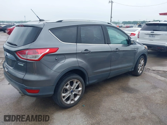 2014 Ford Escape Titanium with VIN 1FMCU0JX8EUD31028, listed as a IAAI auction lot 41943690 with 91,295 mi miles. Bid and sale history available at carsss.com. Image 4.