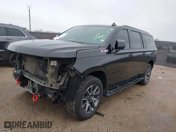2022 Chevrolet Suburban Z71 with VIN 1GNSKDKD3NR251387, listed as a IAAI auction lot 41566234 with 154,014 mi miles. Bid and sale history available at carsss.com. Image 2.