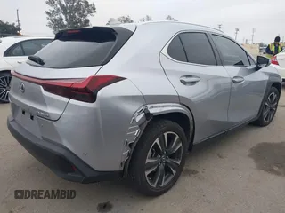 2023 Lexus UX 250h with VIN JTHX6JBH6P2143926, listed as a IAAI auction lot 42180779 with 65,106 mi miles and . Bid and sale history available at DreamBid. Image 4.