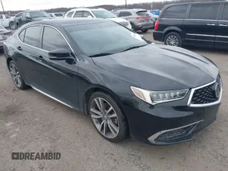 2020 Acura TLX w/Technology Pkg with VIN 19UUB2F43LA003332, listed as a IAAI auction lot 41630479 with 56,237 mi miles. Bid and sale history available at carsss.com. Image 1.