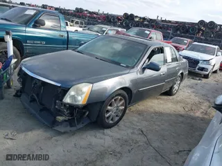 2009 Cadillac DTS w/1SA with VIN 1G6KD57Y09U120203, listed as a IAAI auction lot 41510746 with 173,192 mi miles. Bid and sale history available at carsss.com. Image 2.