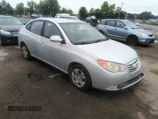 2010 Hyundai Elantra GLS z VIN KMHDU4AD6AU185885, wystawiony jako IAAI lot #42466100 z przebiegiem 200 842 mil mil oraz . Historia ofert i sprzedaży dostępna na DreamBid. Obrazek 1.