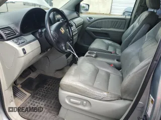 2006 Honda Odyssey EX-L z VIN 5FNRL38796B104224, wystawiony jako Copart lot #59049985 z przebiegiem 161 476 mil mil oraz Czysty tytuł • Clean title. Historia ofert i sprzedaży dostępna na DreamBid. Obrazek 7.