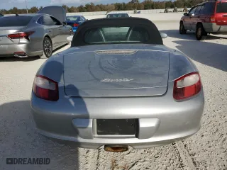 2007 Porsche Boxster with VIN WP0CA29867U711901, listed as a Copart auction lot 77470004 with 0 mi miles and Salvage Title. Bid and sale history available at carsss.com. Image 6.