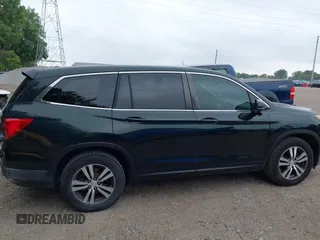 2016 Honda Pilot EX-L with VIN 5FNYF6H59GB100369, listed as a IAAI auction lot 42684252 with 146,609 mi miles and . Bid and sale history available at DreamBid. Image 13.