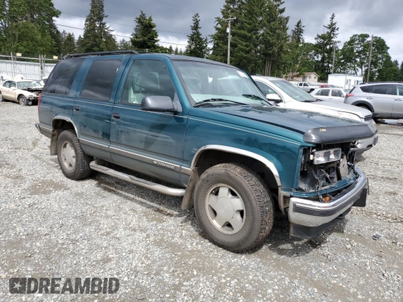 1998 Chevrolet Tahoe z VIN 1GNEK13R2WJ304666, wystawiony jako Copart lot #57833815 z przebiegiem 199 103 mil mil oraz Szkoda całkowita • Salvage title. Historia ofert i sprzedaży dostępna na DreamBid. Obrazek 4.