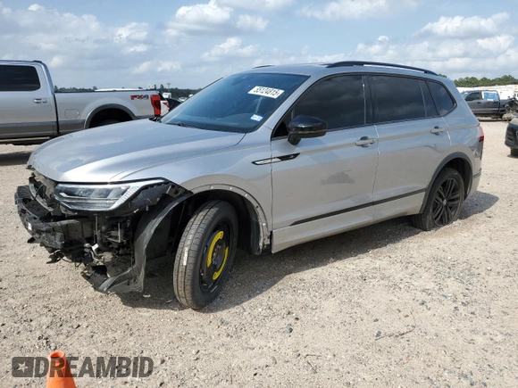 2022 Volkswagen Tiguan SE R-Line Black with VIN 3VVCB7AX6NM140264, listed as a Copart auction lot 55124815 with 28,340 mi miles and Salvage title. Bid and sale history available at DreamBid. Image 1.