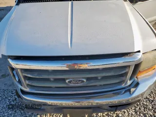 1999 Ford F-350 XL with VIN 1FTSW30F4XEB76477, listed as a Copart auction lot 56373415 with 240,170 mi miles and Salvage title. Bid and sale history available at DreamBid. Image 11.