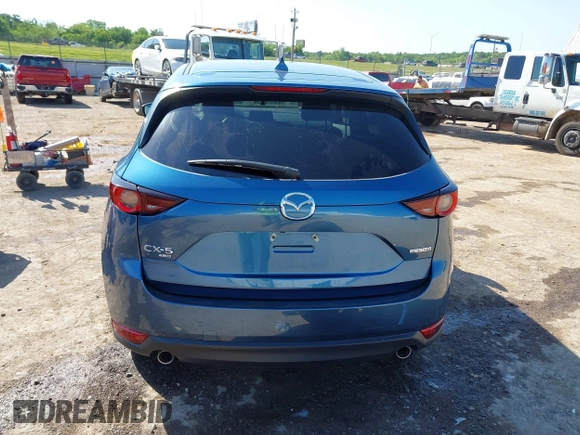 2020 Mazda CX-5 Touring z VIN JM3KFBCM2L0848233, wystawiony jako IAAI lot #42189719 z przebiegiem 80 893 mil mil oraz . Historia ofert i sprzedaży dostępna na DreamBid. Obrazek 17.