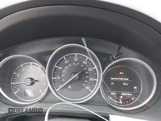2018 Mazda CX-5 Grand Touring with VIN JM3KFBDM3J0384431, listed as a IAAI auction lot 42013474 with 65,018 mi miles. Bid and sale history available at carsss.com. Image 7.