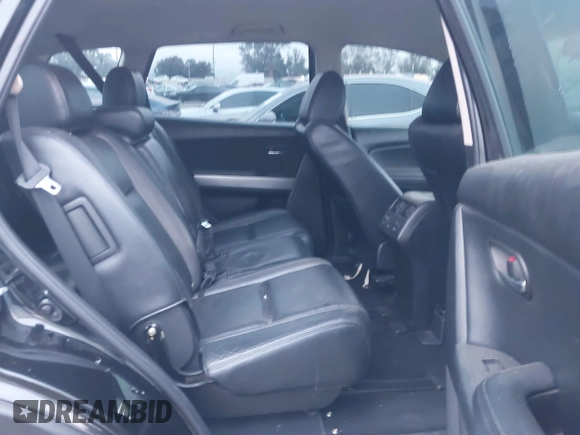 2010 Mazda CX-9 Touring with VIN JM3TB3MV7A0233588, listed as a IAAI auction lot 41189888 with 210,649 mi miles and . Bid and sale history available at carsss.com. Image 8.