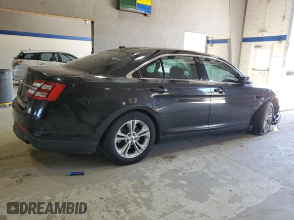 2014 Ford Taurus SEL z VIN 1FAHP2E84EG112877, wystawiony jako Copart lot #52612065 z przebiegiem 103 306 mil mil oraz Szkoda całkowita • Salvage title. Historia ofert i sprzedaży dostępna na DreamBid. Obrazek 3.