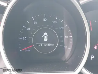 2015 Kia Optima LX with VIN KNAGM4A75F5632779, listed as a IAAI auction lot 41701231 with 174,458 mi miles. Bid and sale history available at carsss.com. Image 7.