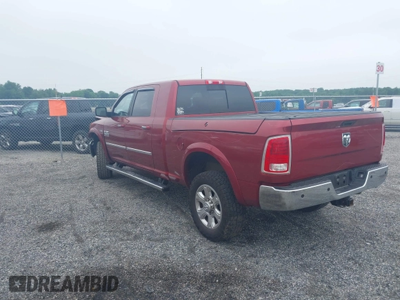 2014 Ram 2500 Laramie with VIN 3C6UR5NJ1EG276591, listed as a IAAI auction lot 42517879 with 145,466 mi miles and . Bid and sale history available at DreamBid. Image 3.