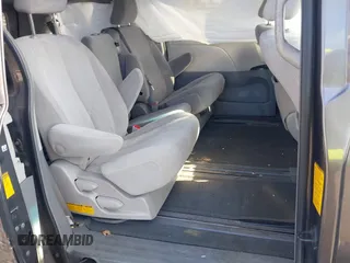 2014 Toyota Sienna LE AAS with VIN 5TDKK3DC5ES483532, listed as a IAAI auction lot 41905911 with 122,392 mi miles and . Bid and sale history available at DreamBid. Image 8.
