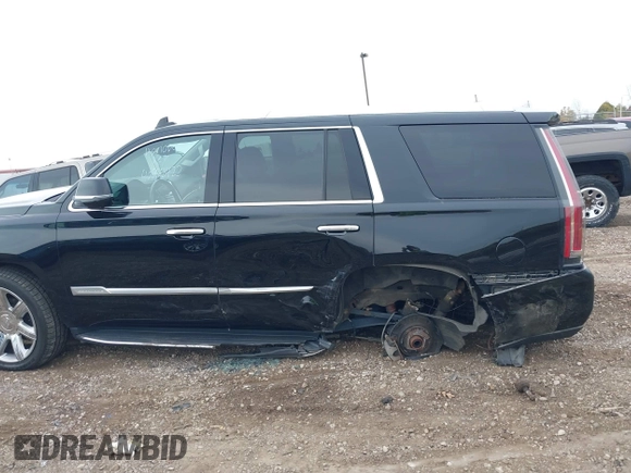 2019 Cadillac Escalade Luxury z VIN 1GYS4BKJ1KR398505, wystawiony jako IAAI lot #40662422 z przebiegiem 57 932 mil mil oraz . Historia ofert i sprzedaży dostępna na DreamBid. Obrazek 14.