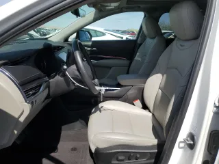 2023 Cadillac XT4 FWD Luxury with VIN 1GYAZAR46PF134602, listed as a Copart auction lot 54684865 with 13,221 mi miles and Salvage title. Bid and sale history available at DreamBid. Image 7.