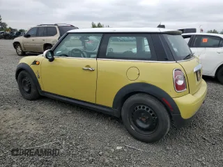 2011 MINI Hardtop with VIN WMWSU3C58BTX96968, listed as a Copart auction lot 62560915 with 88,616 mi miles and Salvage title. Bid and sale history available at DreamBid. Image 2.