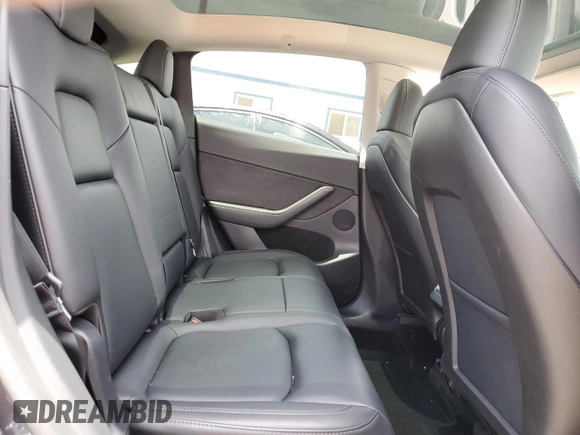 2024 Tesla Model Y Long Range with VIN 7SAYGAEE5RF088151, listed as a Copart auction lot 52651015 with 6,185 mi miles and Clean title. Bid and sale history available at DreamBid. Image 10.