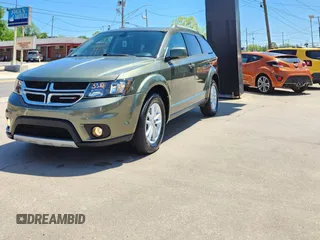 2017 Dodge Journey SXT with VIN 3C4PDCBG4HT598882, listed as a Copart auction lot 56783495 with 89,771 mi miles and Salvage Title. Bid and sale history available at DreamBid. Image 4.