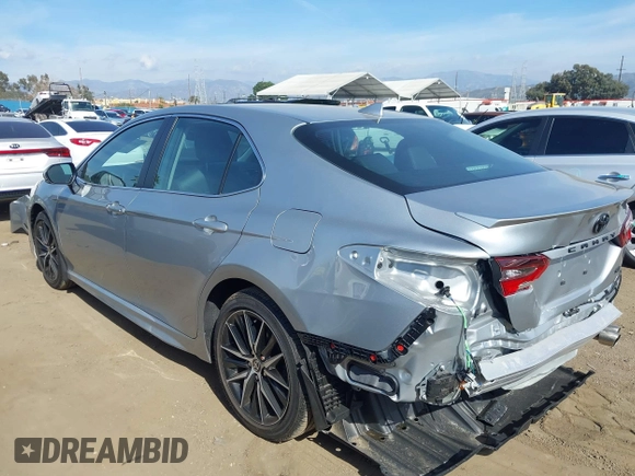 2023 Toyota Camry SE z VIN 4T1T11AK0PU153203, wystawiony jako IAAI lot #38763517 z przebiegiem 11 171 mil mil oraz . Historia ofert i sprzedaży dostępna na DreamBid. Obrazek 3.