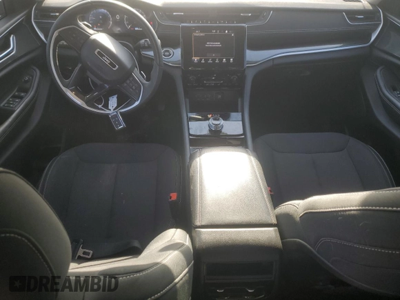 2023 Jeep Grand Cherokee Laredo with VIN 1C4RJGAG0PC534276, listed as a Copart auction lot 48182115 with 18,657 mi miles and Salvage title. Bid and sale history available at DreamBid. Image 8.