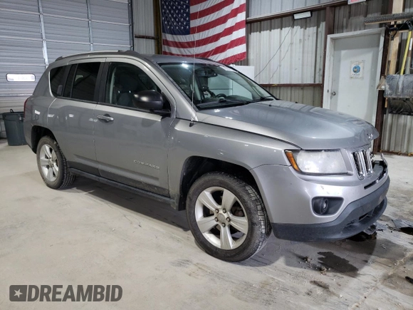 2016 Jeep Compass Sport with VIN 1C4NJCBA1GD512864, listed as a Copart auction lot 56297115 with 216,693 mi miles and Salvage title. Bid and sale history available at DreamBid. Image 4.