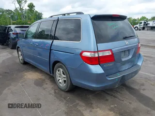 2007 Honda Odyssey EX with VIN 5FNRL38437B126937, listed as a IAAI auction lot 42098793 with 212,343 mi miles and . Bid and sale history available at DreamBid. Image 3.