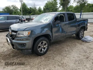 2015 Chevrolet Colorado 2WD Z71 with VIN 1GCGSCE30F1146978, listed as a Copart auction lot 56800985 with 201,186 mi miles and Salvage title. Bid and sale history available at DreamBid. Image 1.