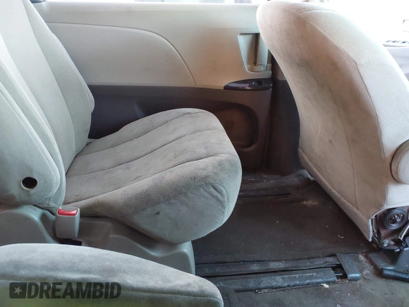 2012 Toyota Sienna with VIN 5TDKA3DC1CS011022, listed as a IAAI auction lot 41415386 with 209,552 mi miles and . Bid and sale history available at DreamBid. Image 8.