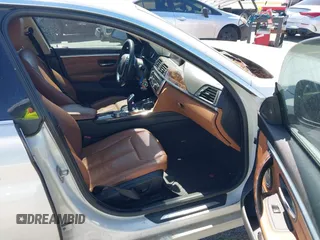 2015 BMW 4 Series 428i with VIN WBA4A5C58FGK15335, listed as a IAAI auction lot 41723243 with 152,652 mi miles and . Bid and sale history available at DreamBid. Image 5.