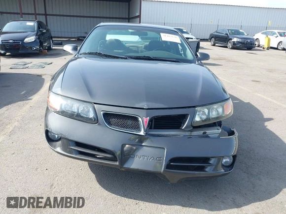2003 Pontiac Bonneville SE z VIN 1G2HX52K934181238, wystawiony jako IAAI lot #41483636 z przebiegiem 176 737 mil mil oraz . Historia ofert i sprzedaży dostępna na DreamBid. Obrazek 12.