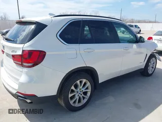 2016 BMW X5 xDrive40e with VIN 5UXKT0C51G0S76171, listed as a IAAI auction lot 41586244 with 85,517 mi miles and . Bid and sale history available at DreamBid. Image 4.