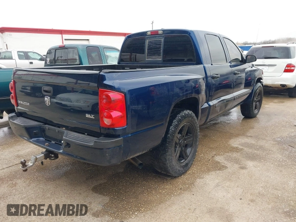 2007 Dodge Dakota SLT with VIN 1D7HE48K07S137252, listed as a IAAI auction lot 41385640 with 223,920 mi miles and . Bid and sale history available at carsss.com. Image 4.