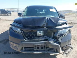 2019 Honda Passport Sport z VIN 5FNYF8H23KB025310, wystawiony jako IAAI lot #41958571 z przebiegiem 63 313 mil mil oraz . Historia ofert i sprzedaży dostępna na DreamBid. Obrazek 6.