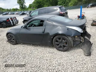 2003 Nissan 350Z Touring z VIN JN1AZ34E43T006603, wystawiony jako Copart lot #57073495 z przebiegiem 236 676 mil mil oraz Szkoda całkowita • Salvage title. Historia ofert i sprzedaży dostępna na DreamBid. Obrazek 2.