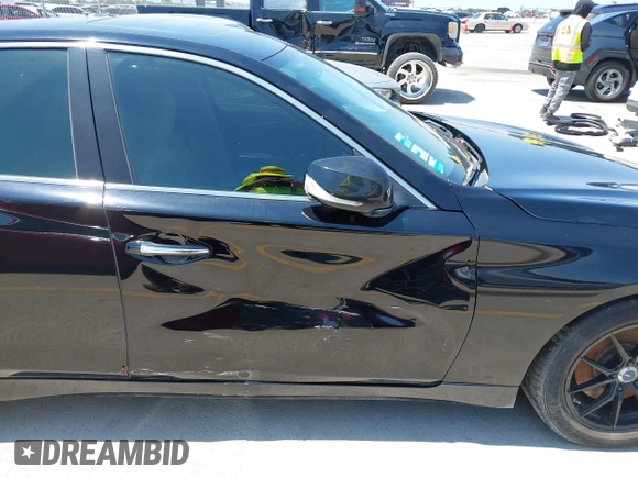 2015 Infiniti Q50 z VIN JN1BV7AP9FM335745, wystawiony jako IAAI lot #42336325 z przebiegiem 153 970 mil mil oraz . Historia ofert i sprzedaży dostępna na DreamBid. Obrazek 14.