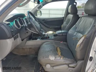 2004 Toyota 4Runner SR5 with VIN JTEZU14RX48021578, listed as a Copart auction lot 52106465 with 330,430 mi miles and Clean Title. Bid and sale history available at carsss.com. Image 7.