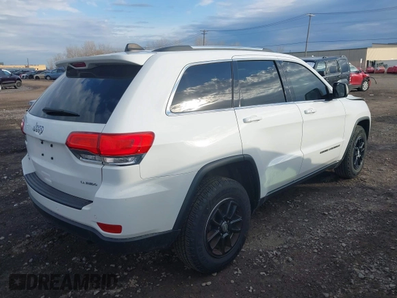 2018 Jeep Grand Cherokee Laredo E with VIN 1C4RJFAG6JC406061, listed as a IAAI auction lot 42046977 with 90,339 mi miles and . Bid and sale history available at DreamBid. Image 4.