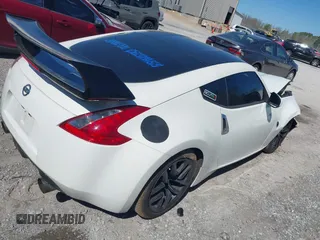 2015 Nissan 370Z Sport with VIN JN1AZ4EH9FM443719, listed as a IAAI auction lot 41677286 with 87,967 mi miles and . Bid and sale history available at DreamBid. Image 4.