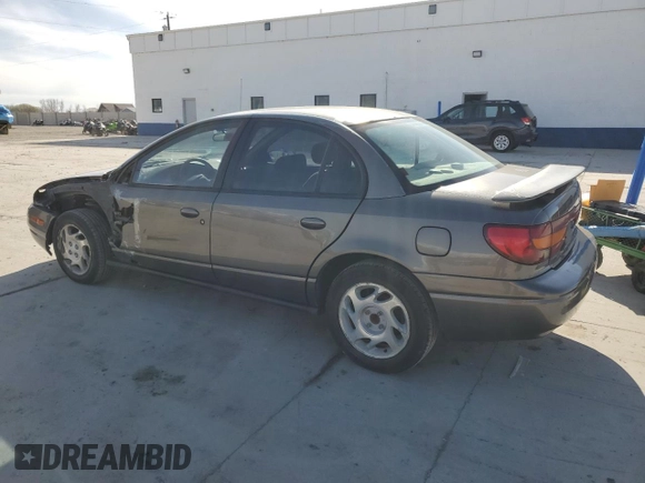 2000 Saturn SL with VIN 1G8ZK5276YZ227493, listed as a Copart auction lot 48172835 with 105,806 mi miles and Salvage title. Bid and sale history available at DreamBid. Image 2.