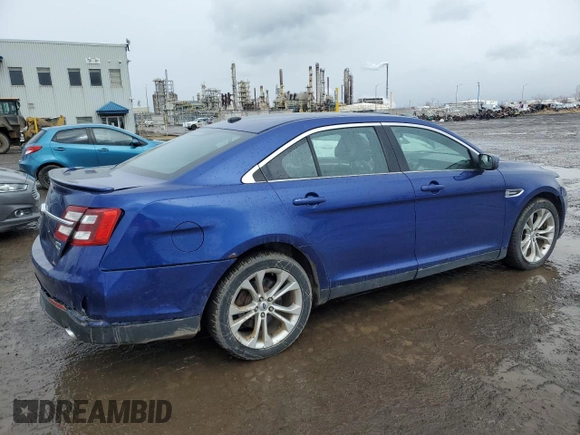 2013 Ford Taurus SEL with VIN 1FAHP2H80DG115530, listed as a Copart auction lot 50353005 with 194,515 mi miles and Salvage Title. Bid and sale history available at DreamBid. Image 3.