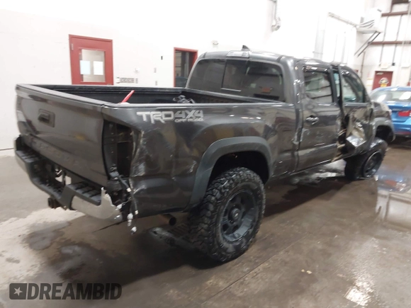 2017 Toyota Tacoma SR5 with VIN 3TMDZ5BN8HM016825, listed as a IAAI auction lot 41658400 with 166,098 mi miles. Bid and sale history available at carsss.com. Image 4.