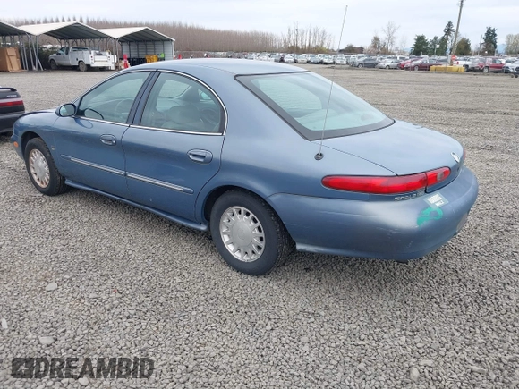 1999 Mercury Sable LS z VIN 1MEFM53S5XA647862, wystawiony jako IAAI lot #41762714 z przebiegiem 165 490 mil mil oraz . Historia ofert i sprzedaży dostępna na DreamBid. Obrazek 3.