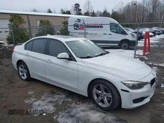 2013 BMW 3 Series 328i with VIN WBA3C1G57DNR49126, listed as a IAAI auction lot 41334342 with 164,710 mi miles. Bid and sale history available at carsss.com. Image 1.