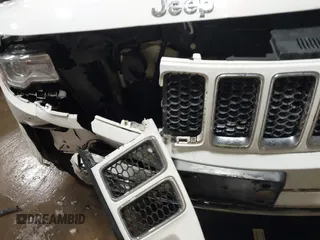 2015 Jeep Grand Cherokee Overland with VIN 1C4RJFCG2FC741015, listed as a IAAI auction lot 41607606 with 132,038 mi miles and . Bid and sale history available at DreamBid. Image 6.