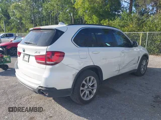 2016 BMW X5 sDrive35i z VIN 5UXKR2C5XG0R70450, wystawiony jako IAAI lot #41470535 z przebiegiem 181 111 mil mil oraz . Historia ofert i sprzedaży dostępna na DreamBid. Obrazek 4.