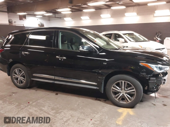 2020 Infiniti QX60 Luxe with VIN 5N1DL0MM4LC540617, listed as a IAAI auction lot 42232162 with 57,866 mi miles and . Bid and sale history available at DreamBid. Image 14.